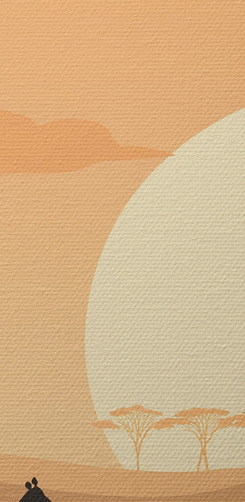 Giraffes walking in a grassy field with trees and a sunset