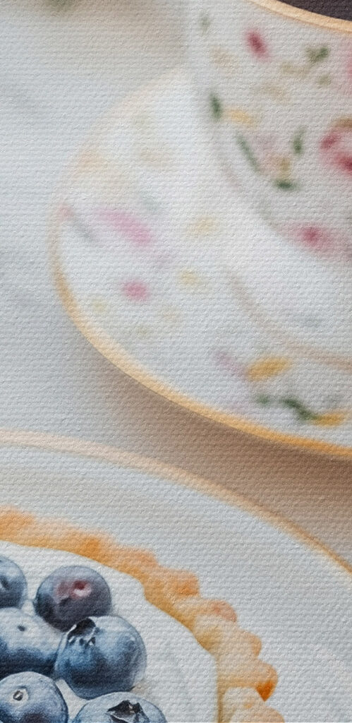 Dessert on a plate with a cup of coffee and flowers