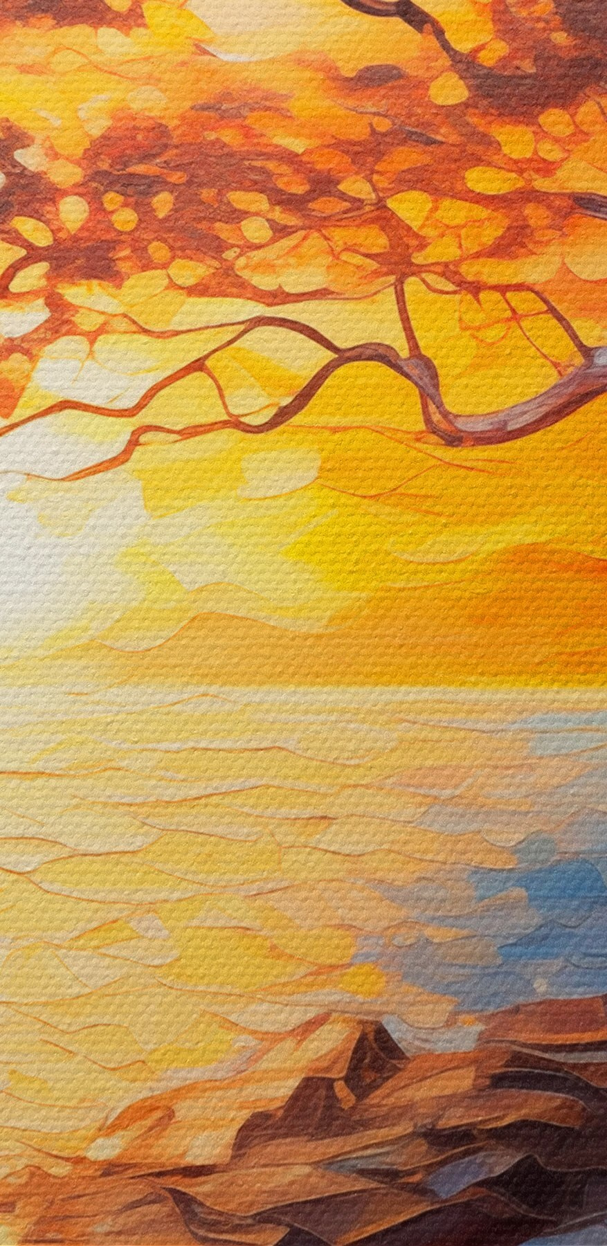Tree on a rocky shore with a sunset behind it Tree on a rocky shore with a sunset behind it