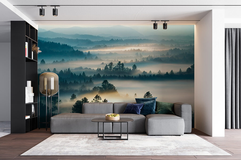 Foggy landscape with trees and mountains