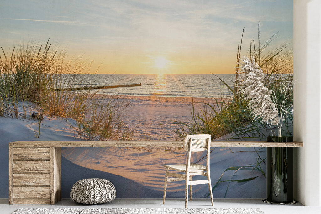 Beach with grass and a body of water