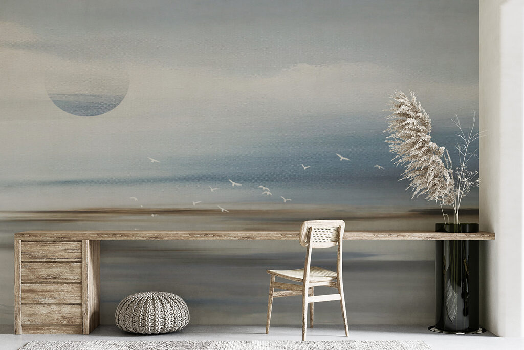 A landscape with birds flying over the horizon