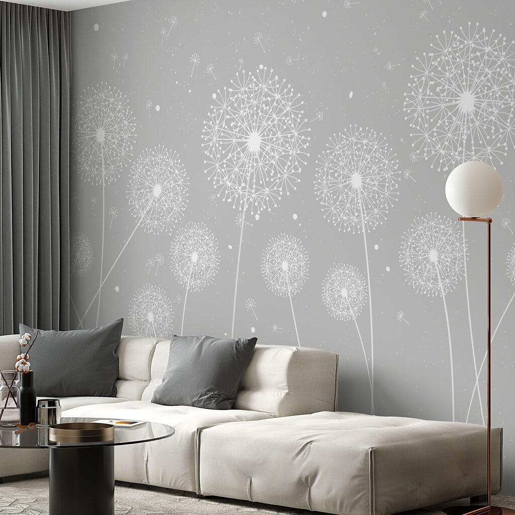 A white dandelions on a grey background A white dandelions on a grey background