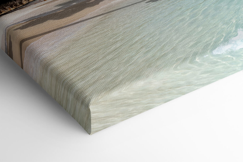 A beach with palm trees and blue water