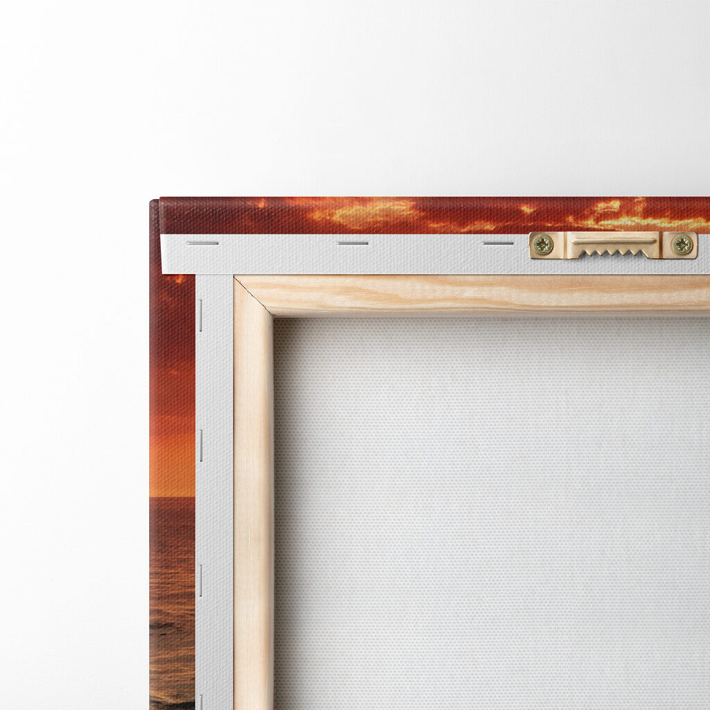 A sunset over a rocky beach