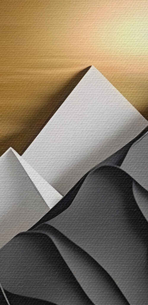 A paper cut out of a mountain landscape A paper cut out of a mountain landscape