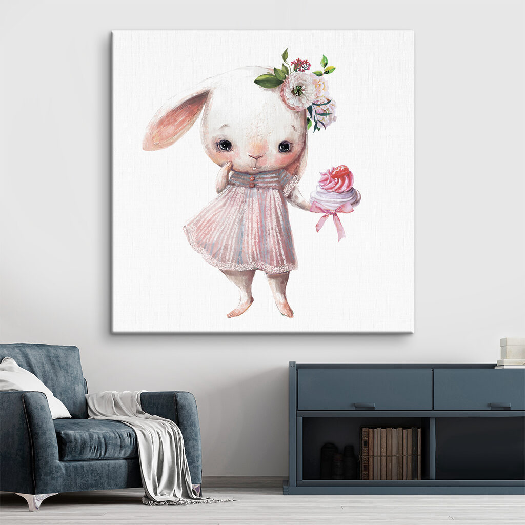 A cartoon of a bunny holding a cupcake A cartoon of a bunny holding a cupcake