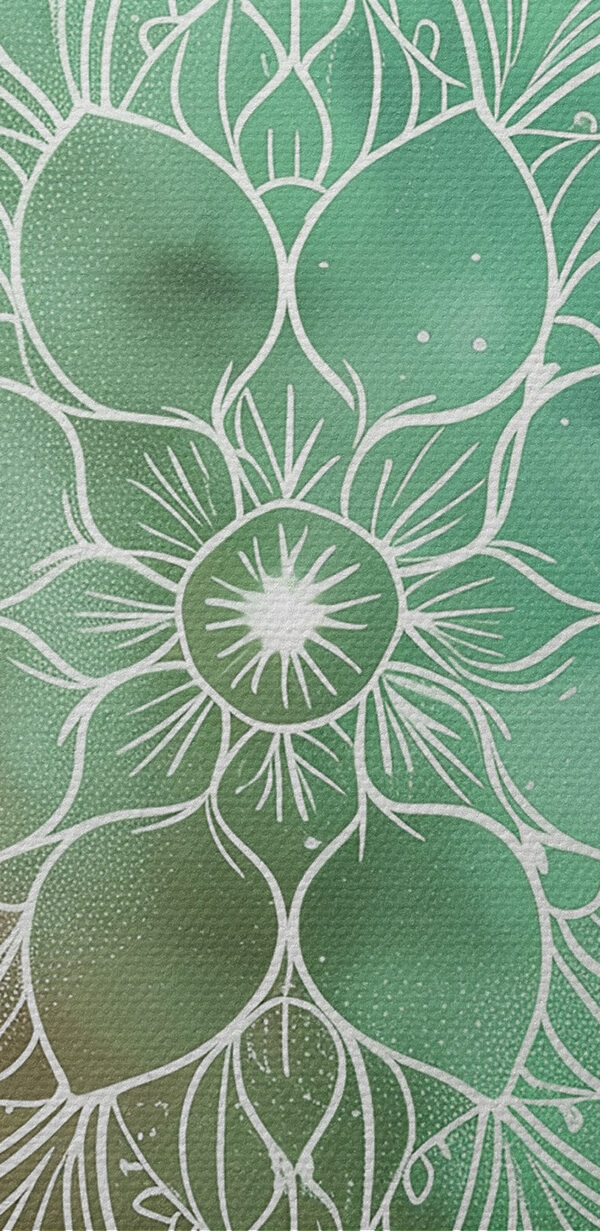 A white mandala on a green and blue background A white mandala on a green and blue background