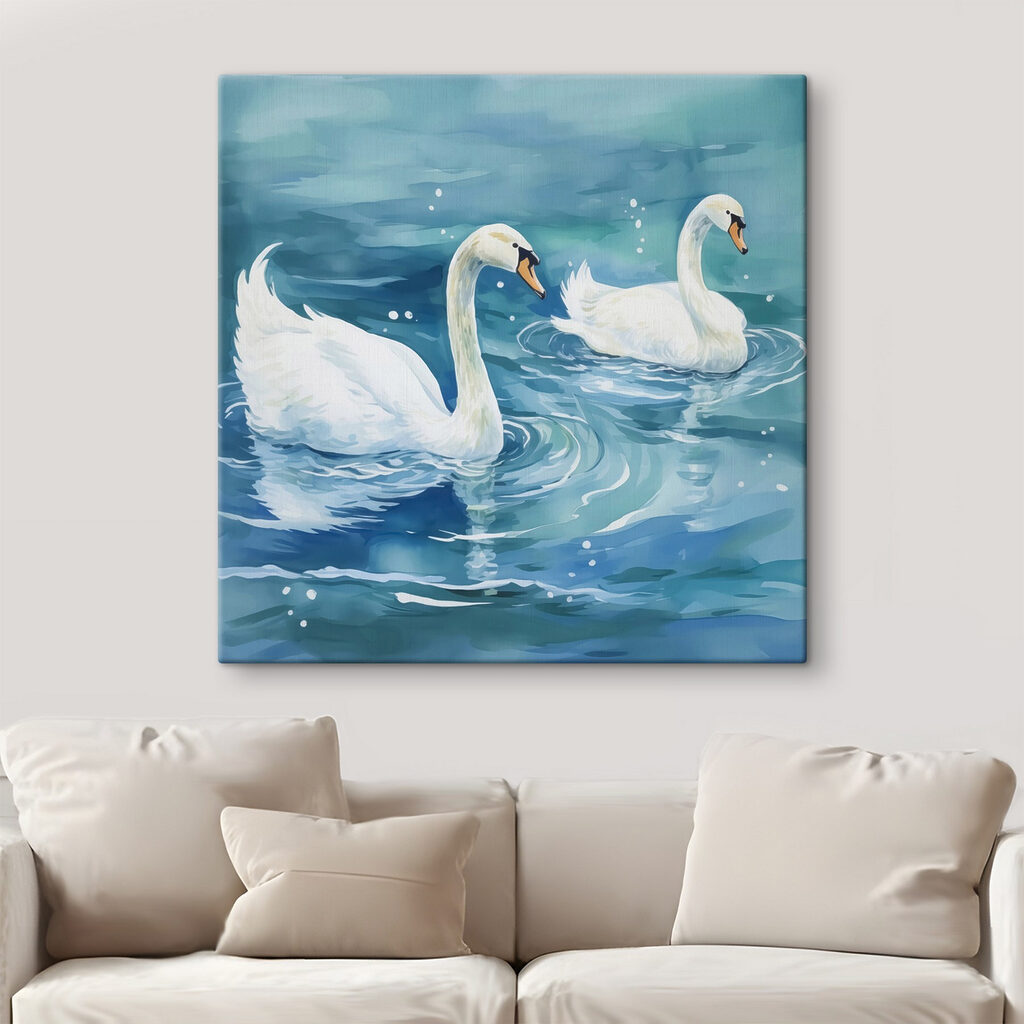 Two swans swimming in water