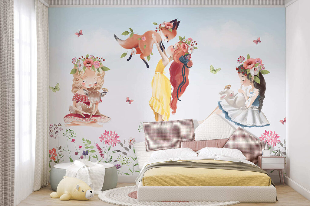 Group of girls holding animals in a field of flowers