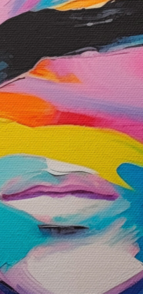 Painting of a woman with colorful paint on her face Painting of a woman with colorful paint on her face