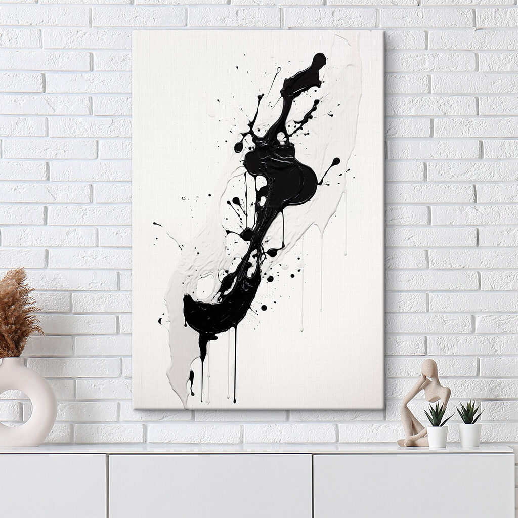 Black and white paint splattered on a white surface Black and white paint splattered on a white surface