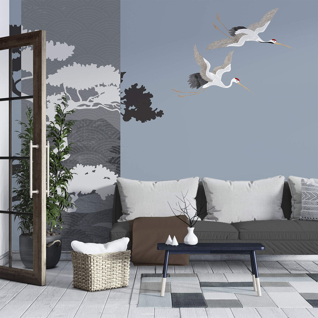 Пара журавлів, що летять поруч з деревом Пара журавлів, що летять поруч з деревом