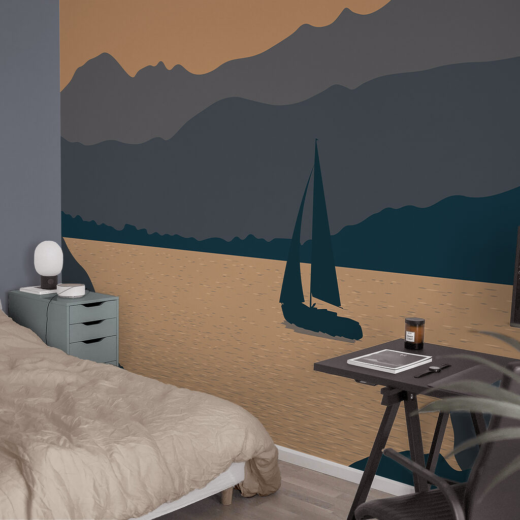 Вітрильник на воді з горами на задньому плані