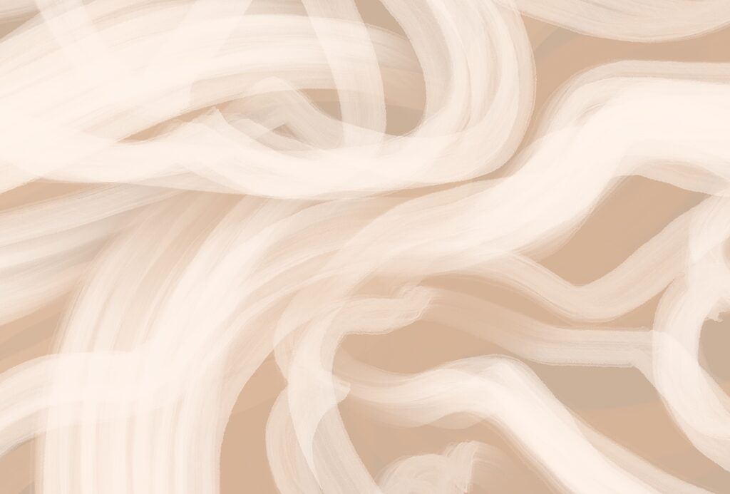 White swirls on a tan background