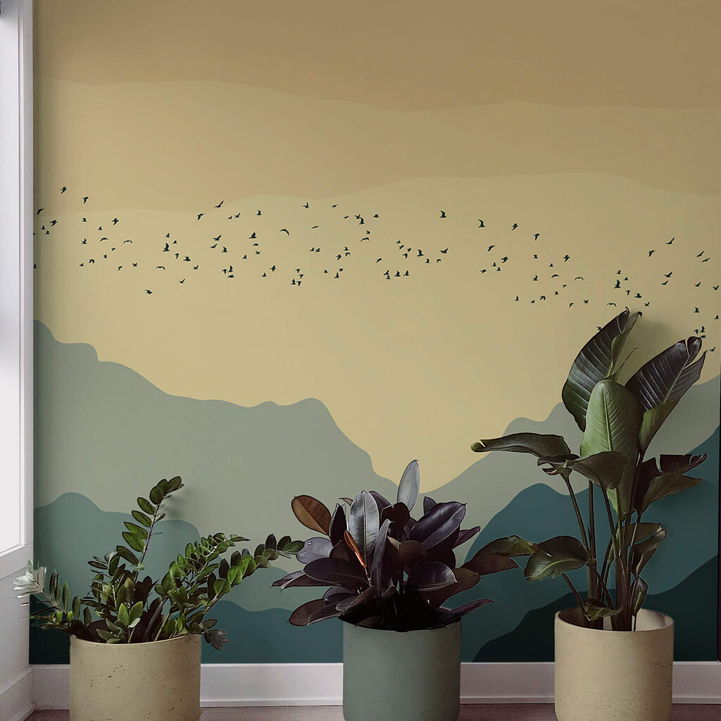 Група птахів летить над горами