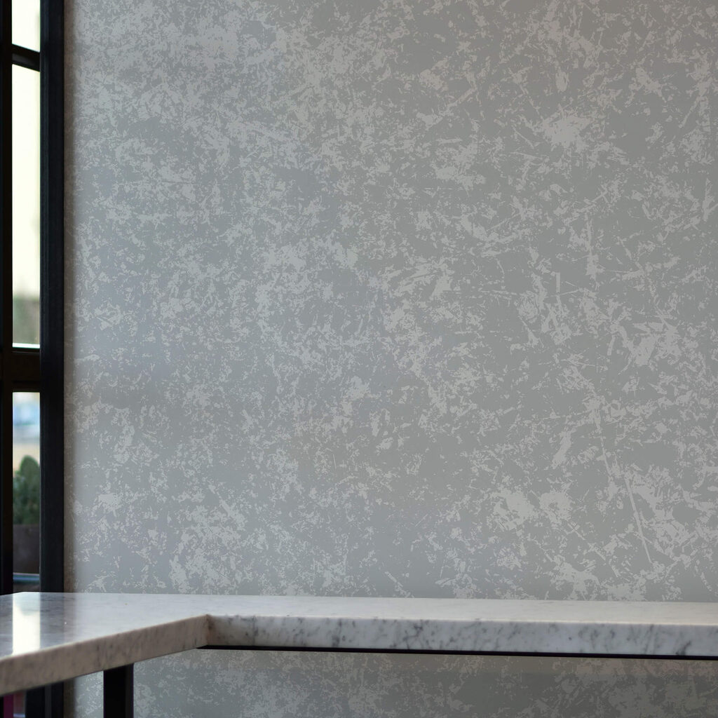 Біла поверхня з дрібними крапками