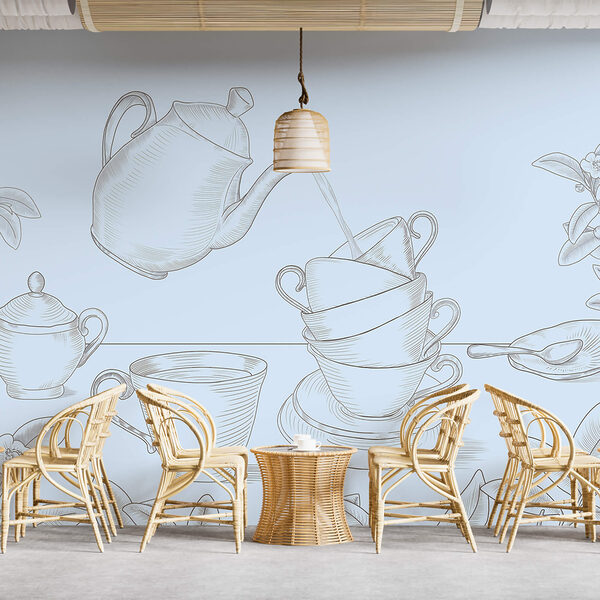 Чайник, що наливає чай у стос чашок Чайник, що наливає чай у стос чашок