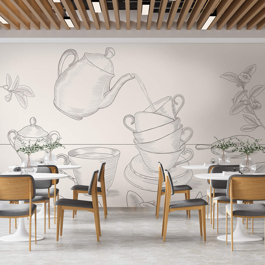 Чайник, що наливає чай у стос чашок Чайник, що наливає чай у стос чашок