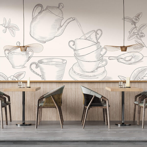 Чайник, що наливає чай у стос чашок Чайник, що наливає чай у стос чашок