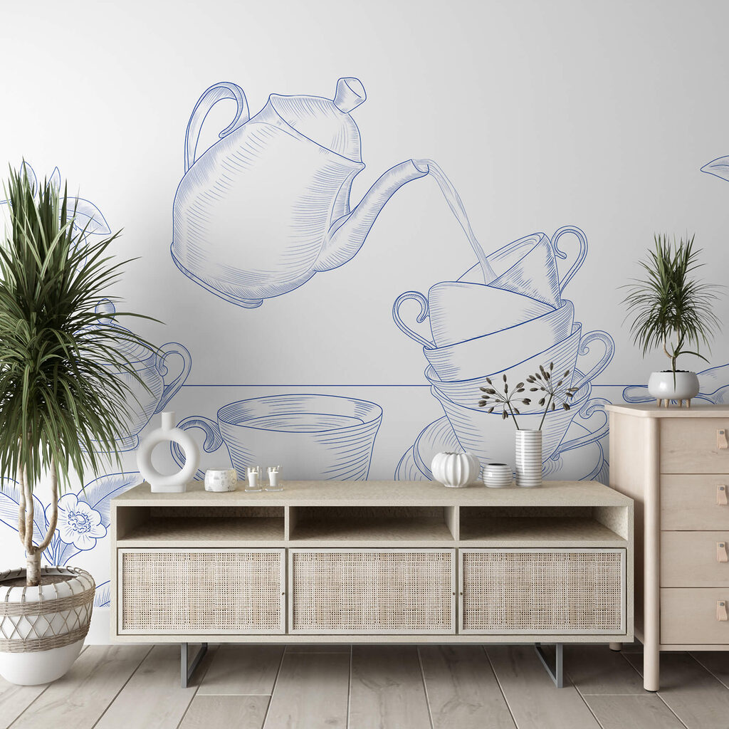 Чайник, що наливає чай у стос чашок