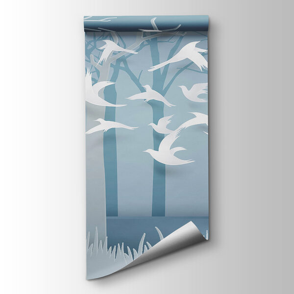Paper cut out of birds flying in the air
