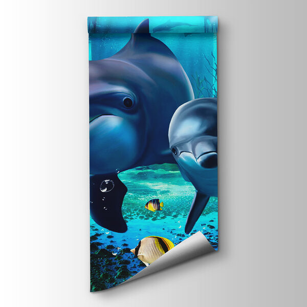 Couple of dolphins swimming in a sea Couple of dolphins swimming in a sea