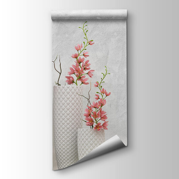 Group of white vases with pink flowers