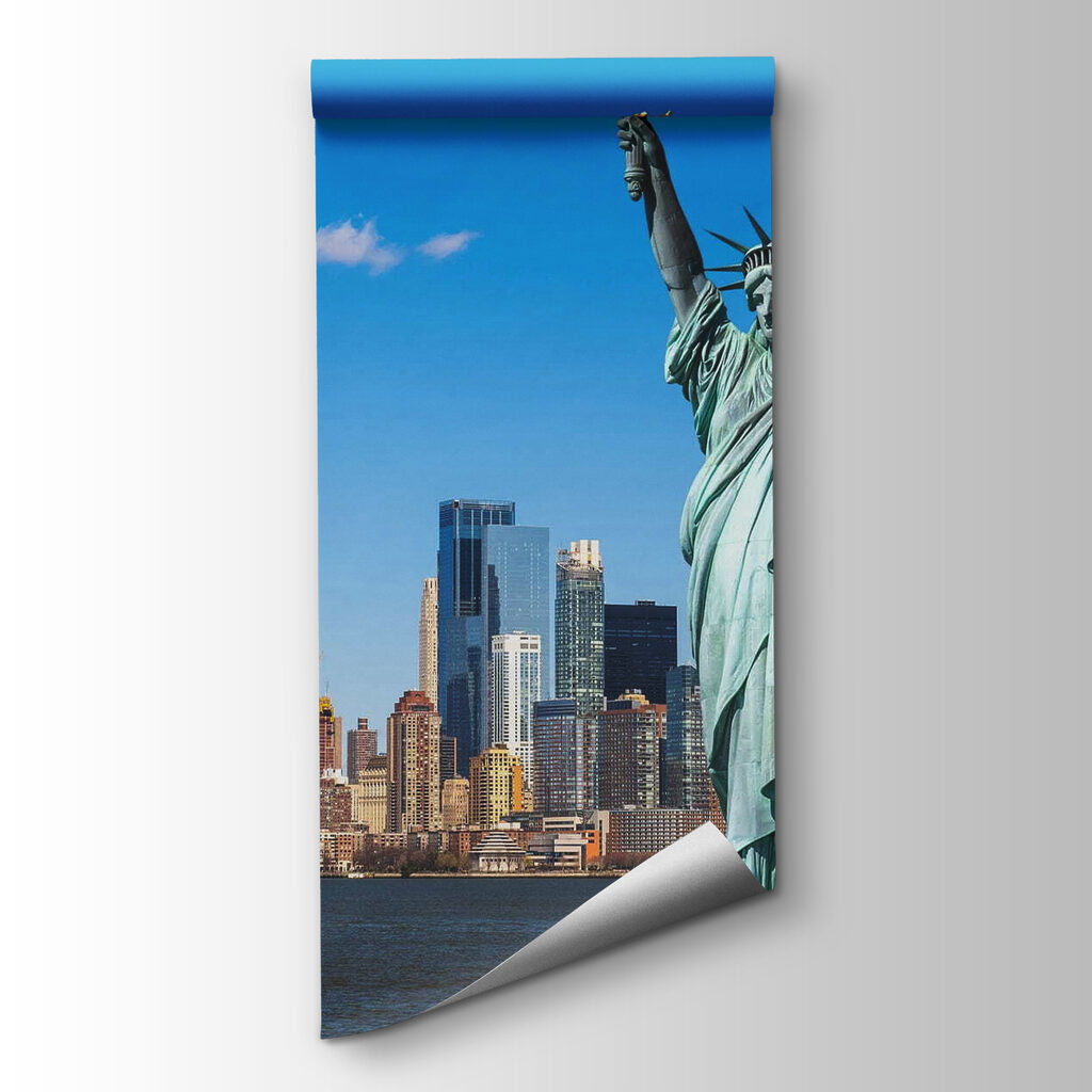 Statue of liberty with a city in the background Statue of liberty with a city in the background