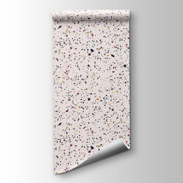 Pink speckled surface with small specks