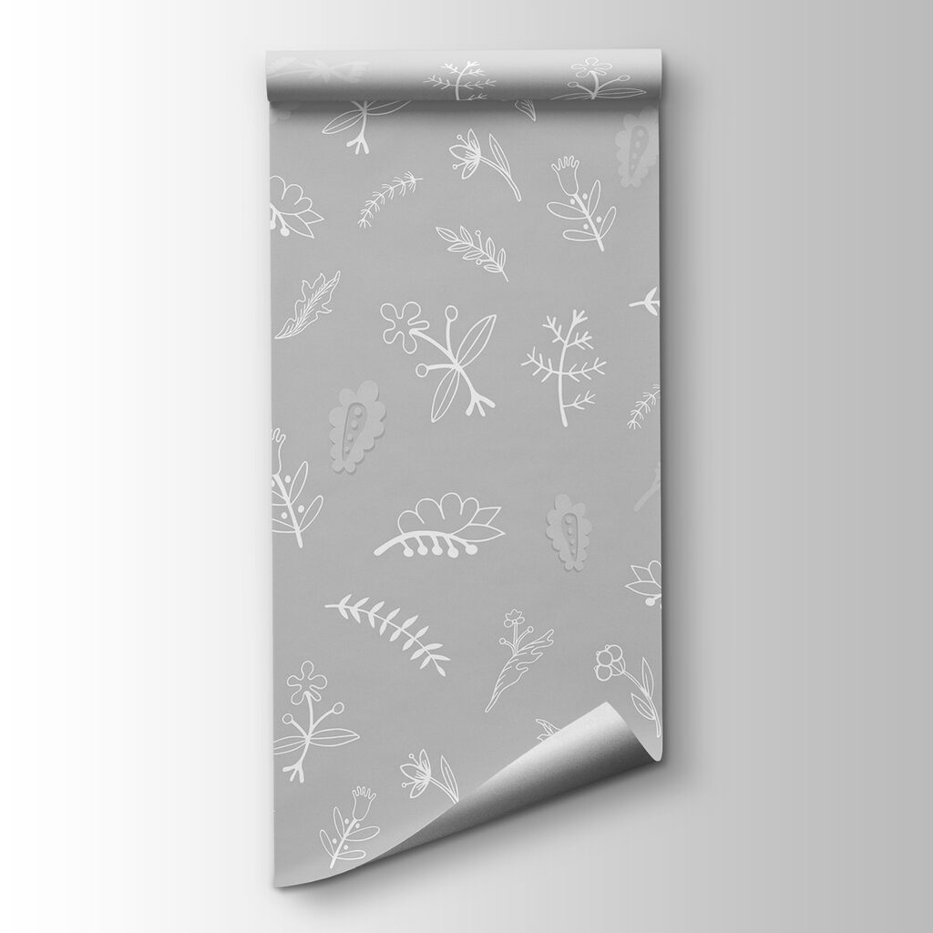 Grey background with white flowers and leaves