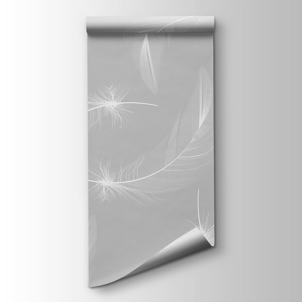 White feathers on a gray background