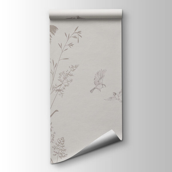 Birds flying over tall grass