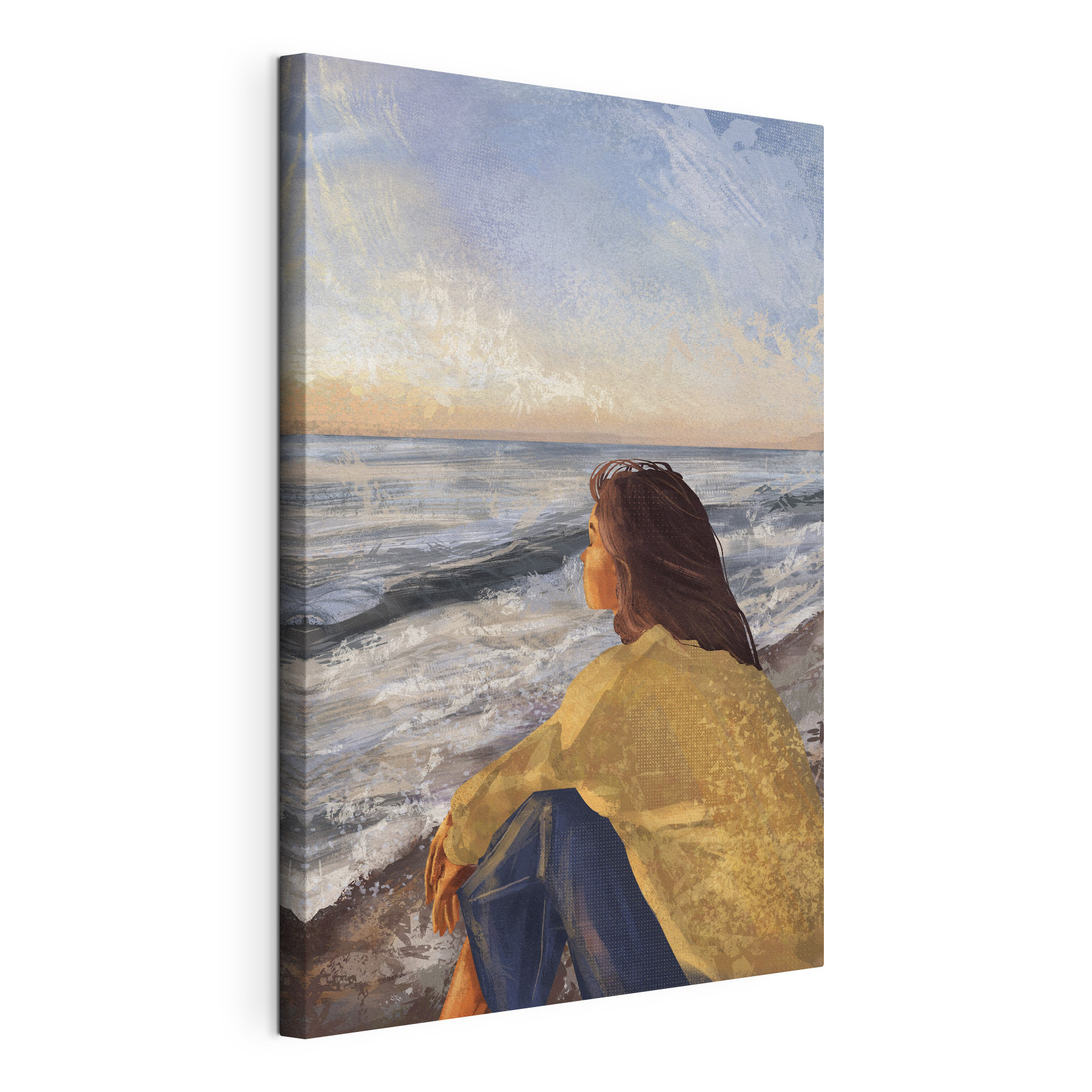 A woman sitting on a beach looking out to the ocean A woman sitting on a beach looking out to the ocean