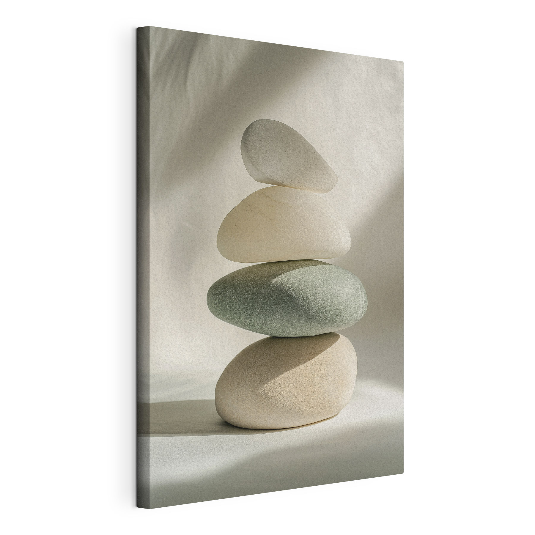Stack of rocks on a white surface Stack of rocks on a white surface