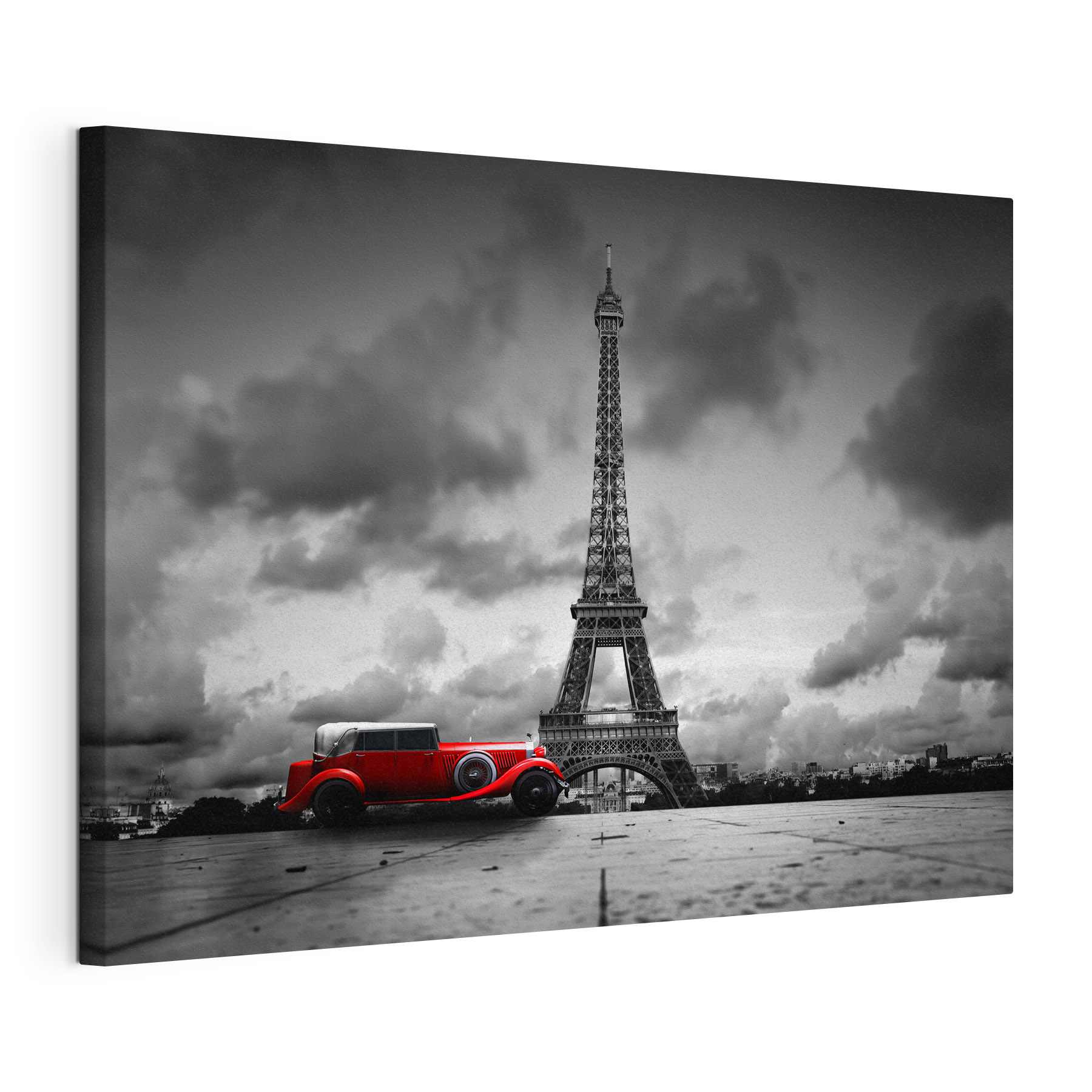 A red car parked in front of a large tower A red car parked in front of a large tower