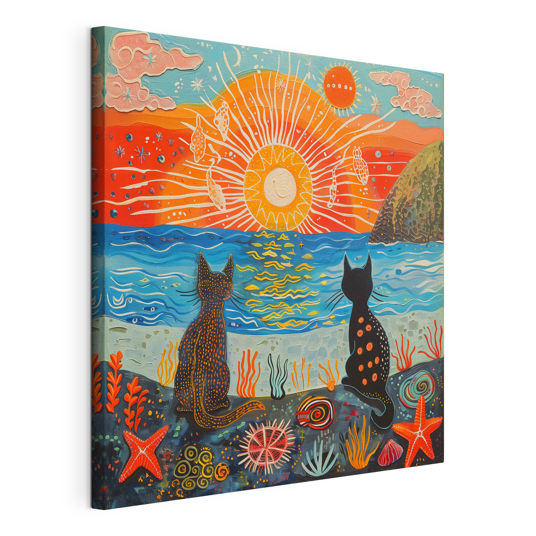 Two cats sitting on a beach looking at the sun