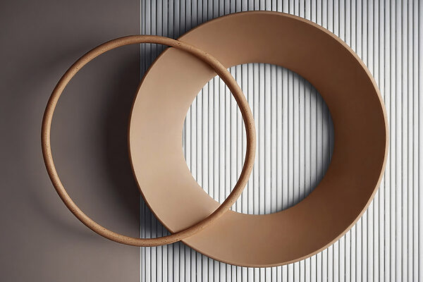 Two circular objects on a wall