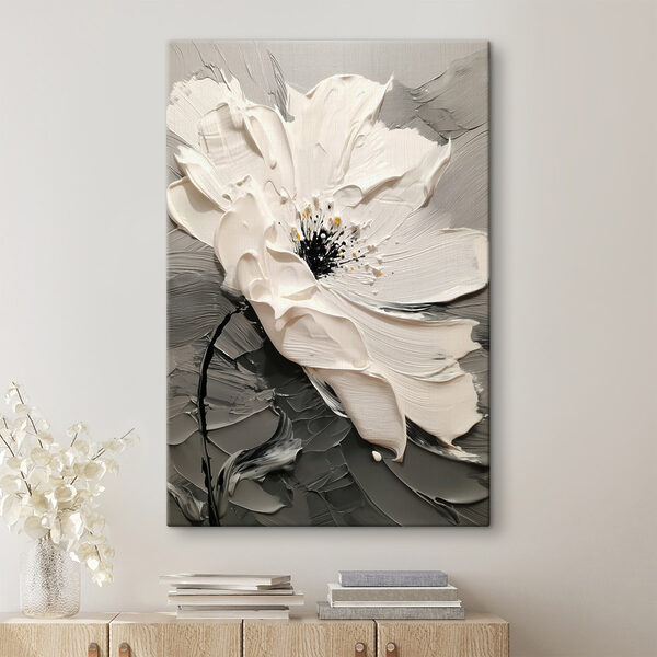 White flower with black center