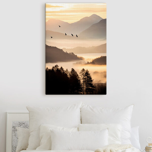 Birds flying over a valley with mountains and fog