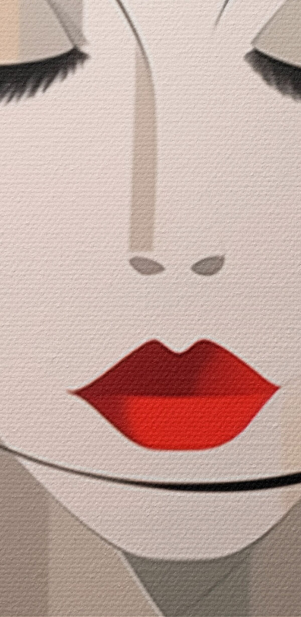 Woman's face with red lips and black hair Woman's face with red lips and black hair