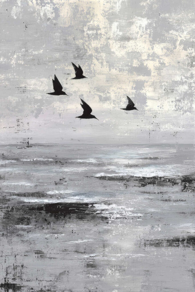 Birds flying in the sky