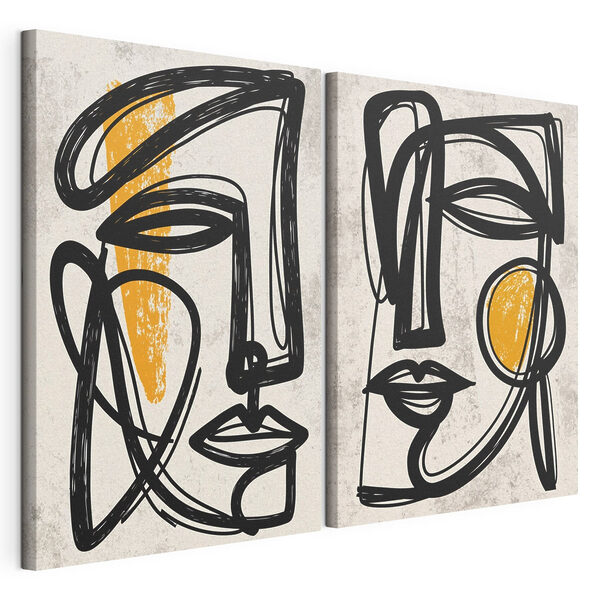 Couple of faces drawn in black and yellow